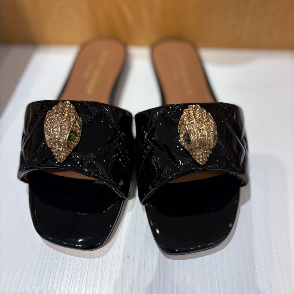 Kurt Geiger Black Slide Sandals with Gold Accent
